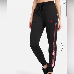 NWT never worn in original packaging.Bebe sequins striped joggers.